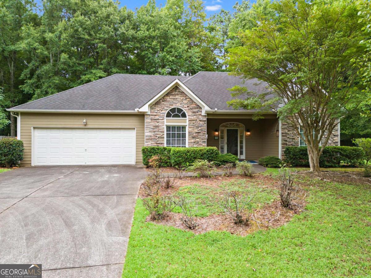 Design the home the way you want it. Easy access to major highways I-75/I-575. Within close proximity to shopping, dining, and recreational facilities. Open and flowing floor plan perfect for entertaining. No stairs and unique room set-ups with flexible living arrangements. Dedicated office room - perfect for remote work or a study space (Room not listed as 4th room). Ample natural light throughout all bedrooms and living room spaces. A fully fenced backyard that provides privacy. Property Line goes beyond the fenced backyard (Buyer to do their own survey). Storage shed in the backyard for lawn equipment, tools, and seasonal items. Private outdoor space perfect for pets. Low-maintenance yard design. SOLD AS IS.