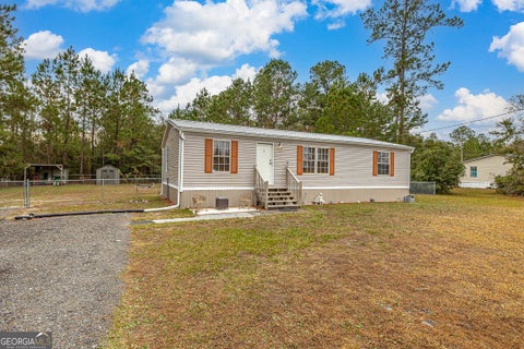 Photo of 1093 Timber Landing Road, Brunswick, GA 31523 (MLS # 10754798)