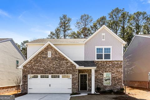 Photo of 7610 Saffron Avenue, Covington, GA 30014 (MLS # 10696683)
