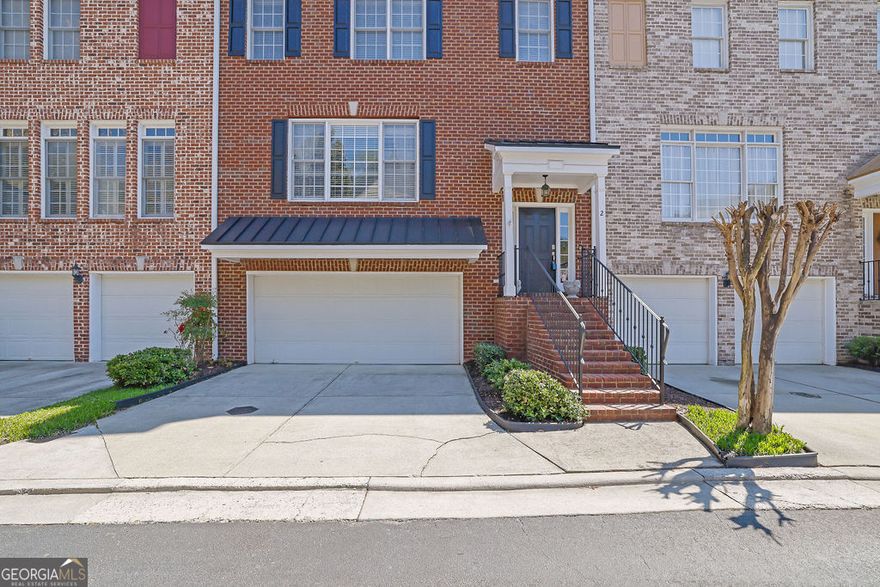 Stunning brick townhome in a highly sought-after community! The main level has beautiful hardwoods and an oversized family room with a gas fireplace. The Kitchen boasts granite countertops, stained cabinets, stainless steel appliances, an island, a breakfast area, and views to the family room. A separate dining room opens to the private back deck. The top level has the primary suite with a walk-in closet, as well as two secondary bedrooms and a full bath.