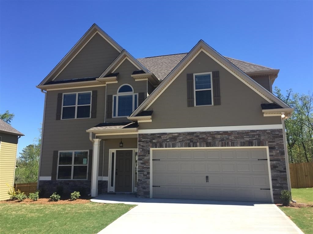Beautiful 4 bedroom, 2.5 bathroom home located in Stillwood Farms! This home features a large kitchen complete with granite countertops, tile backsplash and SS appliances. Downstairs you will also find a formal dining room and oversized family room with working fireplace! All 4 bedrooms are located upstairs with the primary suite offering a dual vanity, soaking tub and separate shower! Prime 30265 location, swim/HOA community, close to Ashley Park, CTCA, Piedmont!