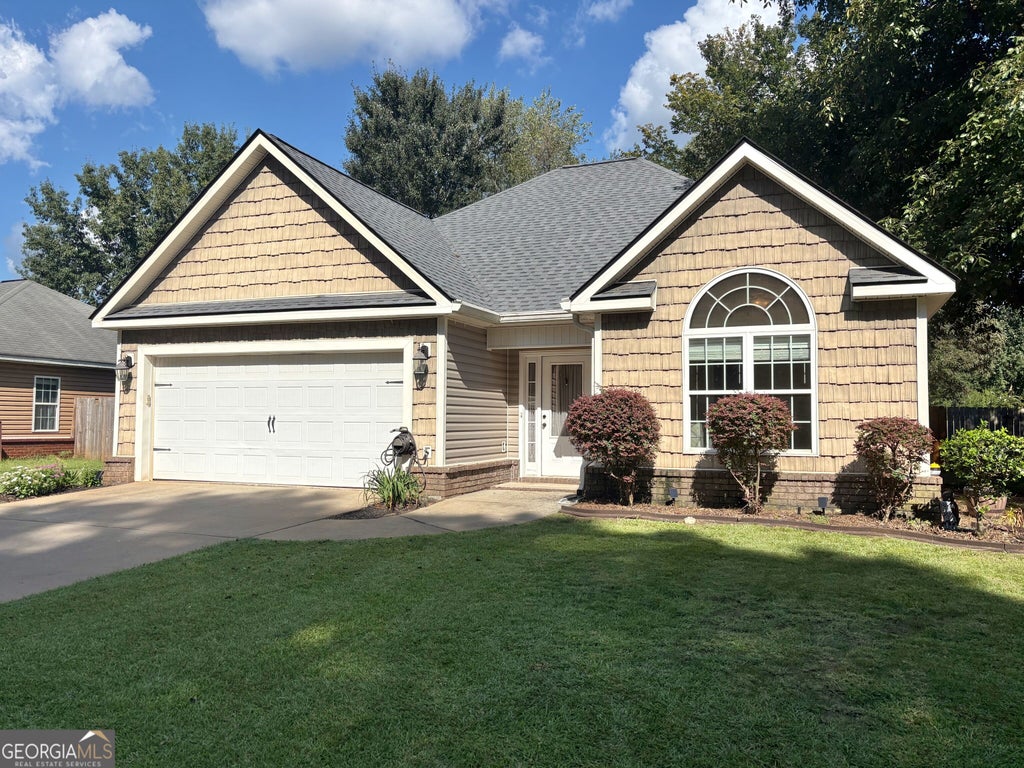 Photo of 304 Madison Place Parkway, Byron, GA 31008 (MLS # 10837621)