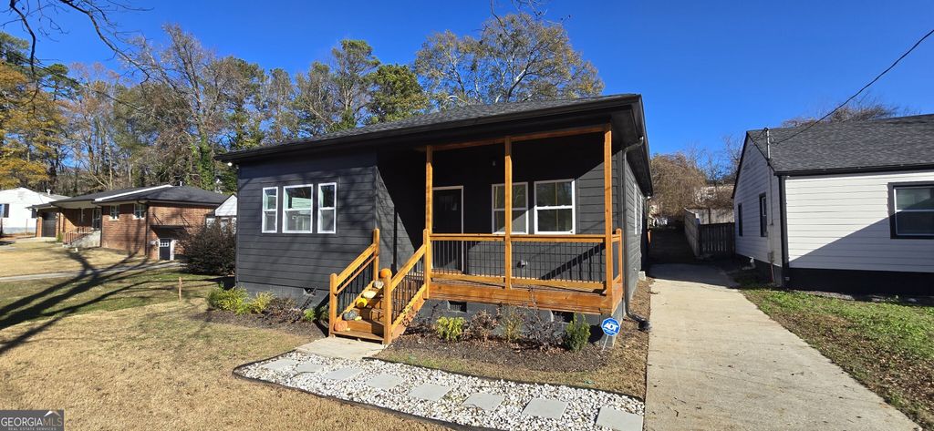 Photo of 639 Ozburn Rd Road NW, Atlanta, GA 30318 (MLS # 10659416)