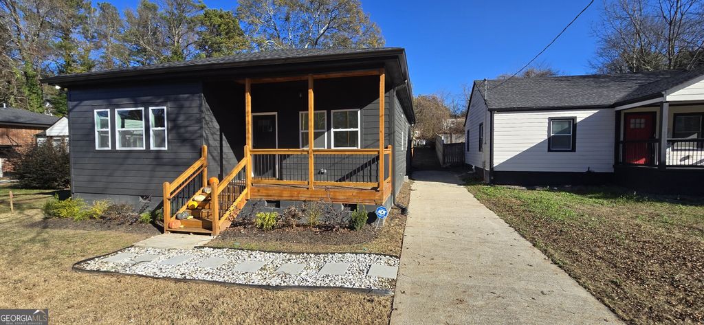 Photo of 639 Ozburn Rd Road NW, Atlanta, GA 30318 (MLS # 10659416)