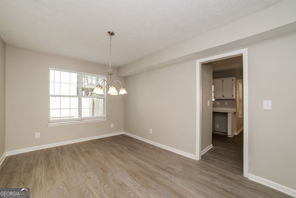 Photo of 1097 Hidden Brook Trail, Atlanta, GA 30349 (MLS # 10650325)