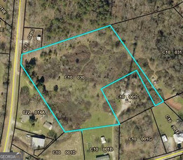 4.82 acre tract in Commerce zoned for duplexes in Jackson County. R2 zoned in Jackson County (not in Commerce city limits but touching city limits) allows for duplex construction! Maximum of 14 dwelling units! Potential for annexation into the City of Commerce! There are not many tracts out there that allow for duplexes so this is a great opportunity. Duplexes must be 2200 sq ft min (1100 sq ft per side) and 4-sided brick construction. Seller is motivated to sell and says bring all offers! Vacant land, easy to show!