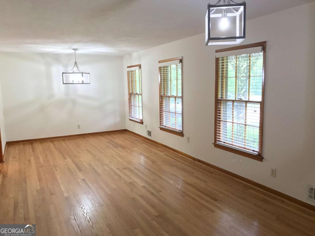 Photo of 1321 Mary Dale Drive, Lilburn, GA 30047 (MLS # 10779629)