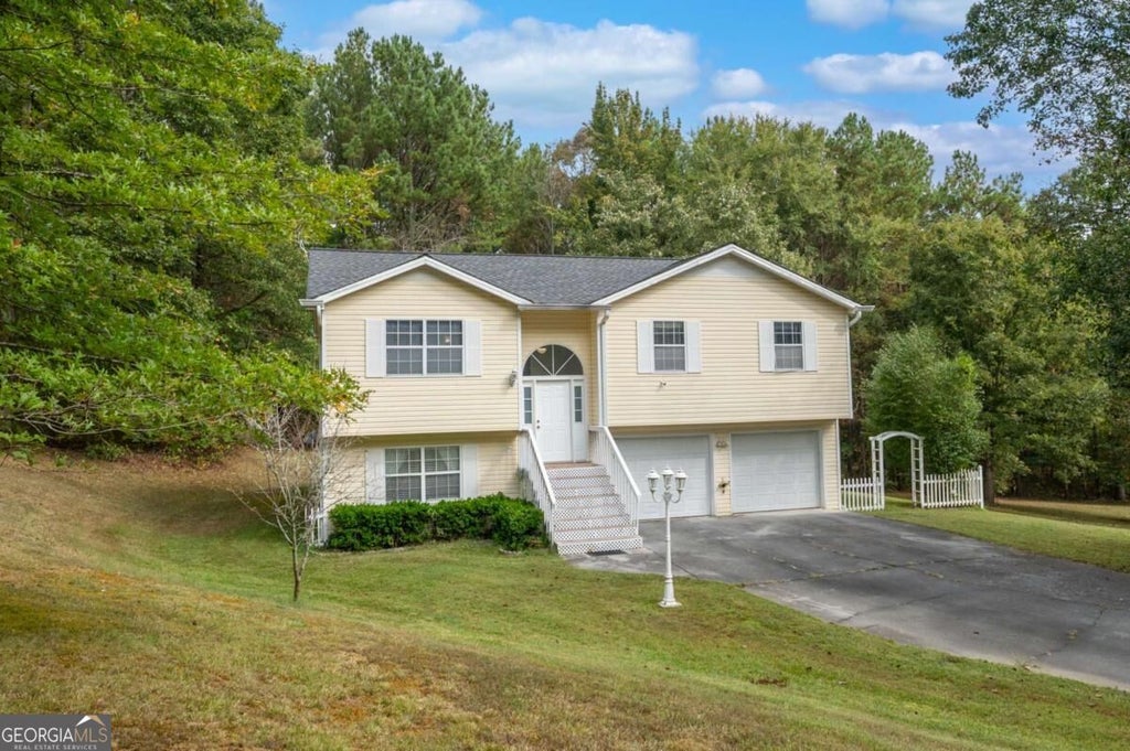 Photo of 309 Russell Hill Estates Drive NW, Sugar Valley, GA 30746 (MLS # 10868286)