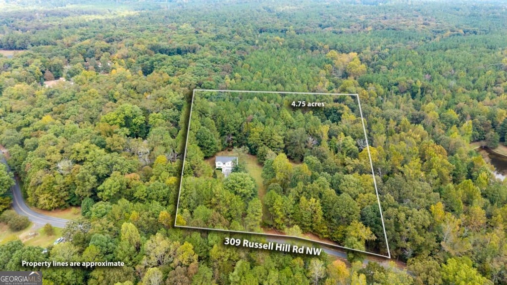 Photo of 309 Russell Hill Estates Drive NW, Sugar Valley, GA 30746 (MLS # 10868286)