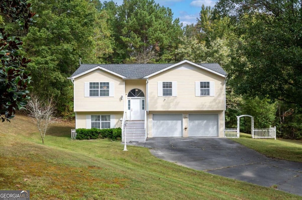 Photo of 309 Russell Hill Estates Drive NW, Sugar Valley, GA 30746 (MLS # 10868286)