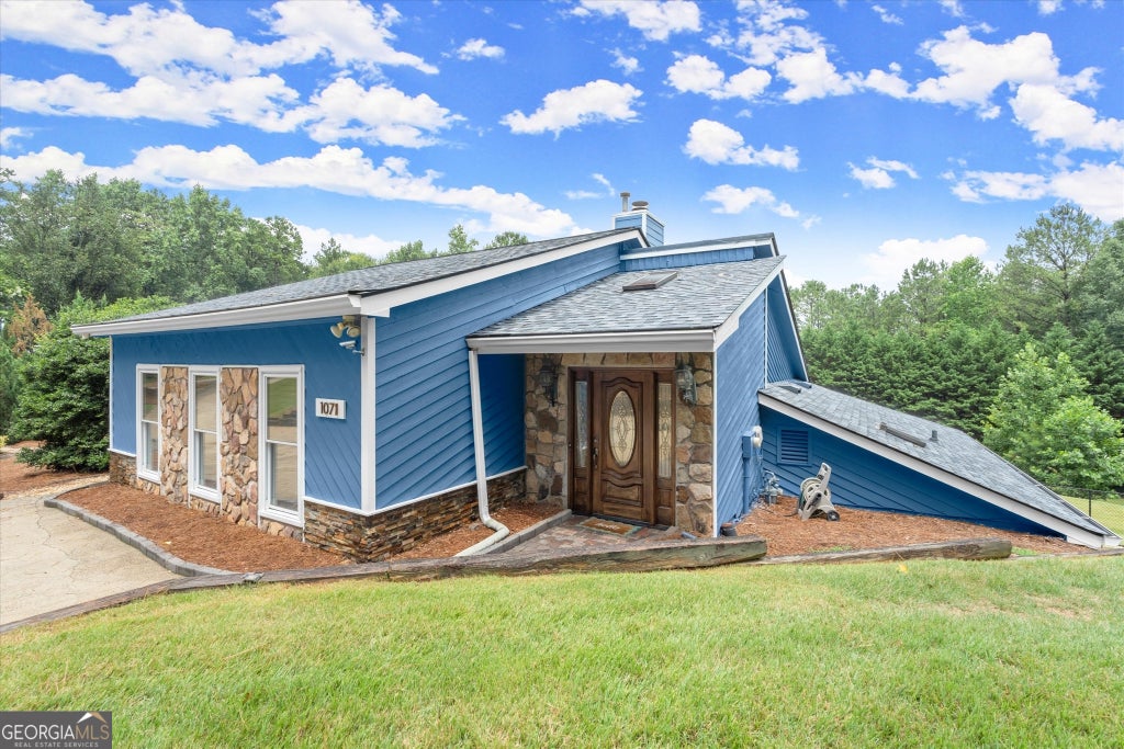 Photo of 1071 Powell Wright Road, Marietta, GA 30066 (MLS # 10850800)