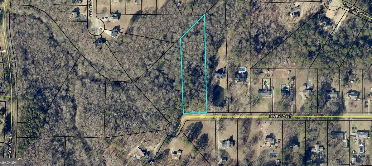 Located just minutes to shopping and dining on the North side of Griffin. Zoned R2, 1750 sqft minimum. No HOA. 2.1 acre lot to build your dream home. Well established neighborhood.