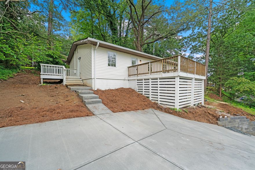 Completely Renovated Gem in the Heart of Downtown Marietta! Welcome to this beautifully updated 3 bedroom, 2 bath home just a short stroll from vibrant Marietta Square. Enjoy the charm of downtown living with the peace of mind that comes from a fully renovated propertyCofeaturing a brand new roof, HVAC system, water heater, plumbing, electrical, and more. Step inside to an inviting open-concept floorplan thatCOs perfect for modern living. The kitchen is the centerpiece, boasting all-new white shaker style cabinets, quartz countertops, stainless steel appliances, and a spacious island that flows seamlessly into the dining and living areas. Durable LVP flooring runs throughout the main living spaces and bedrooms, while both bathrooms showcase stylish tile finishes. The roommate floorplan provides comfort and privacy. Enjoy outdoor living on the brand-new front and side decksCoideal for relaxing or entertaining guests. Showings will begin once the new driveway is completeCodonCOt miss this opportunity to own a turnkey home in one of MariettaCOs most desirable locations!