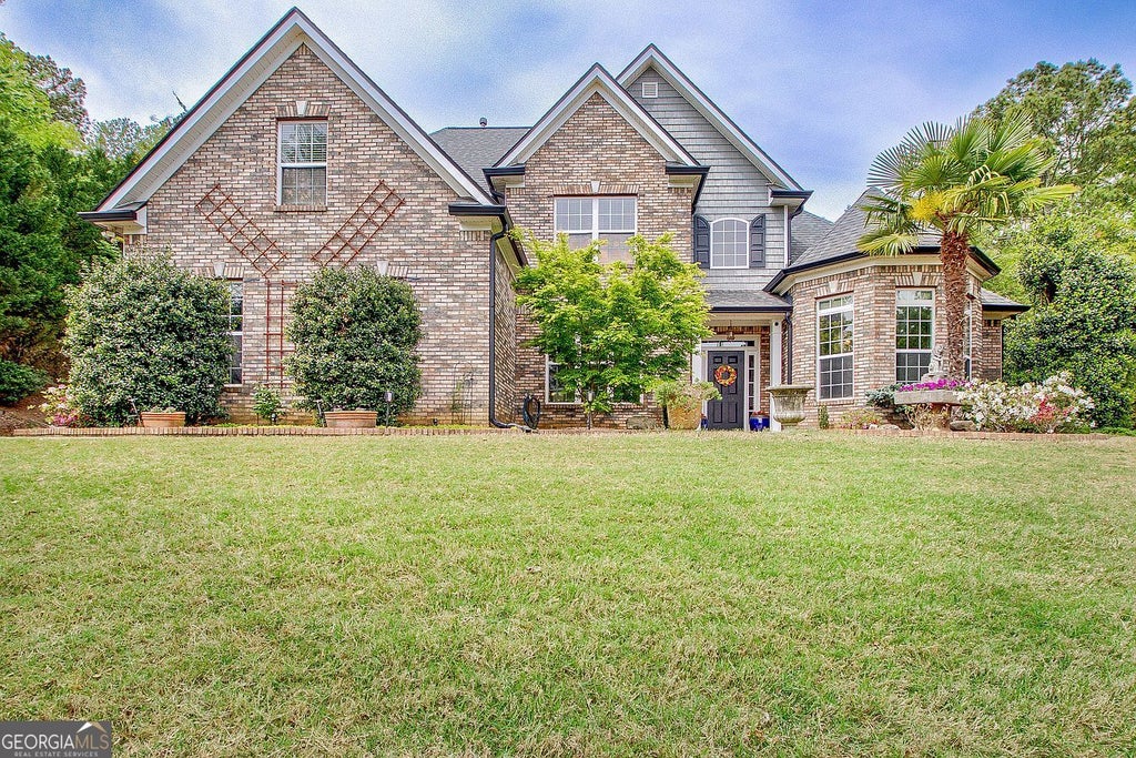 Photo of 374 Persimmon Drive, Sharpsburg, GA 30277 (MLS # 10826270)