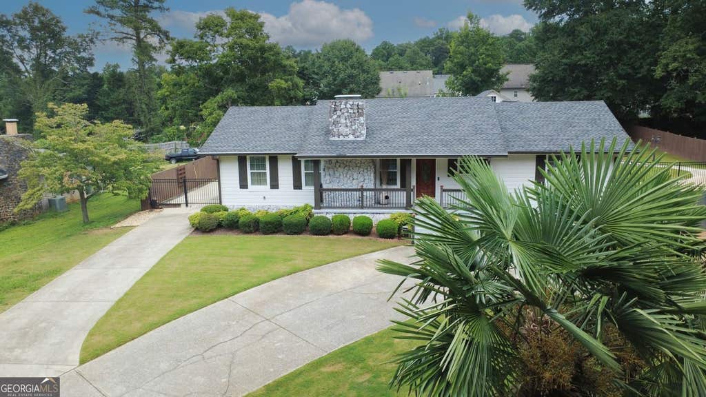 Photo of 569 Garner Way NW, Lilburn, GA 30047 (MLS # 10825569)