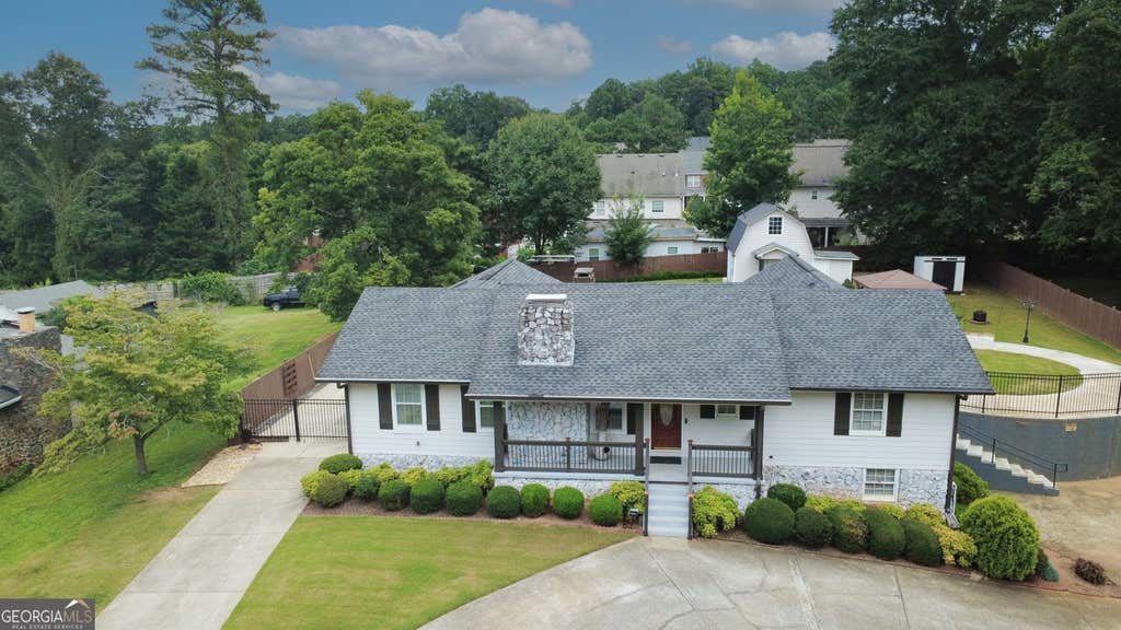 Photo of 569 Garner Way NW, Lilburn, GA 30047 (MLS # 10825569)