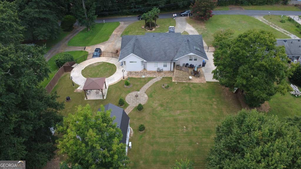 Photo of 569 Garner Way NW, Lilburn, GA 30047 (MLS # 10825569)