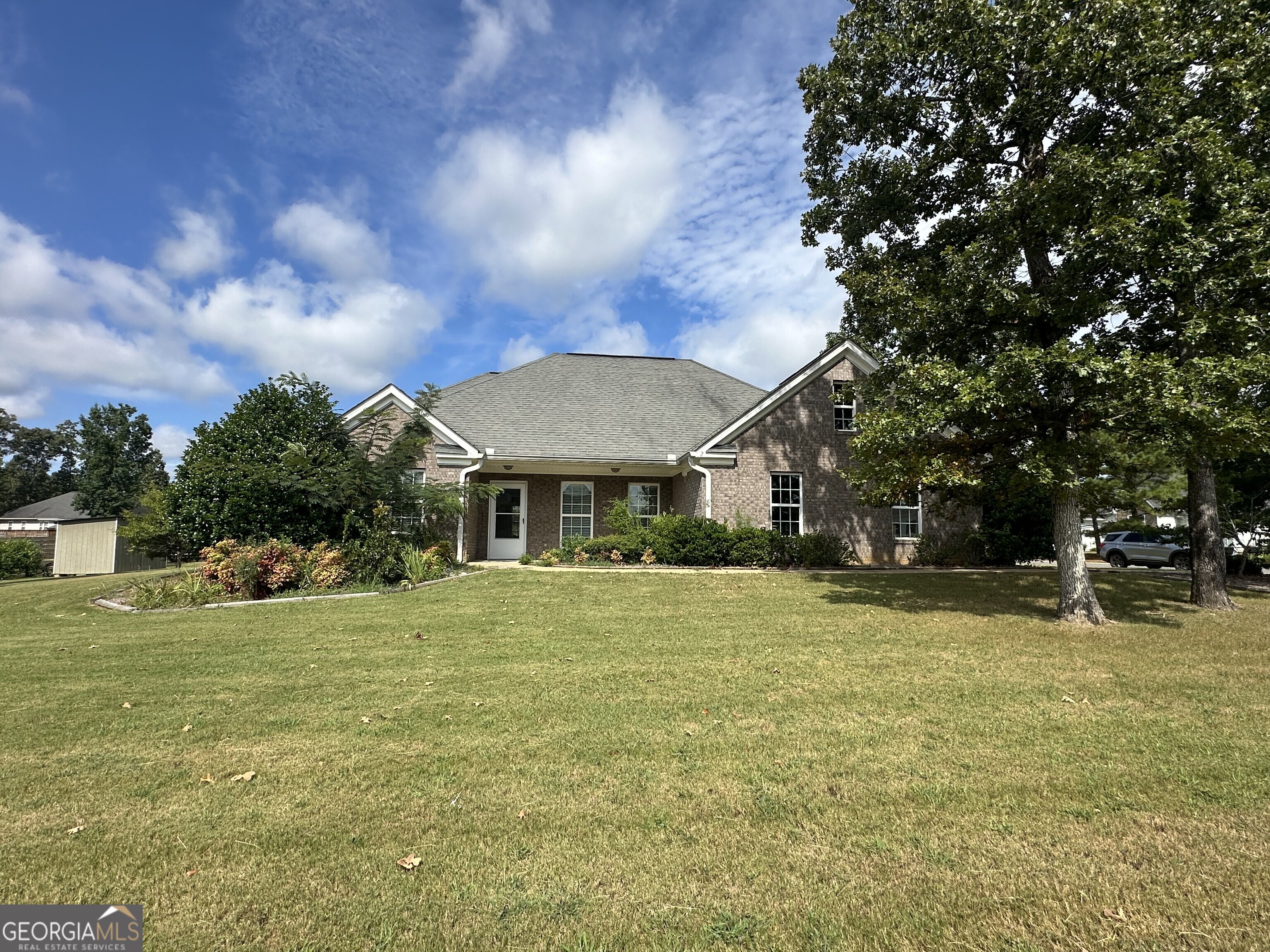 Welcome home to this 3 bedroom, 2 bath ranch in the sought-after Emerald Oaks subdivision, located in the desirable Armuchee School District. The split bedroom floor plan offers privacy, with the owner's suite featuring double vanities, a relaxing garden tub, and a separate shower. Need more space? The office could easily convert back into a 4th bedroom. You'll love the level, step-free front entry, attached 2-car garage, and spacious 0.41-acre lot-complete with a small garden area behind one of the outbuildings. The home is full of potential with just minor cosmetic updates like interior paint. Being SOLD AS-IS, WHERE-IS, bring your vision and make it your own! Interior photos coming soon. Preferred closing attorney: Brumlow, Corwin, Delashmit PC or Cox Byington Twyman LLP