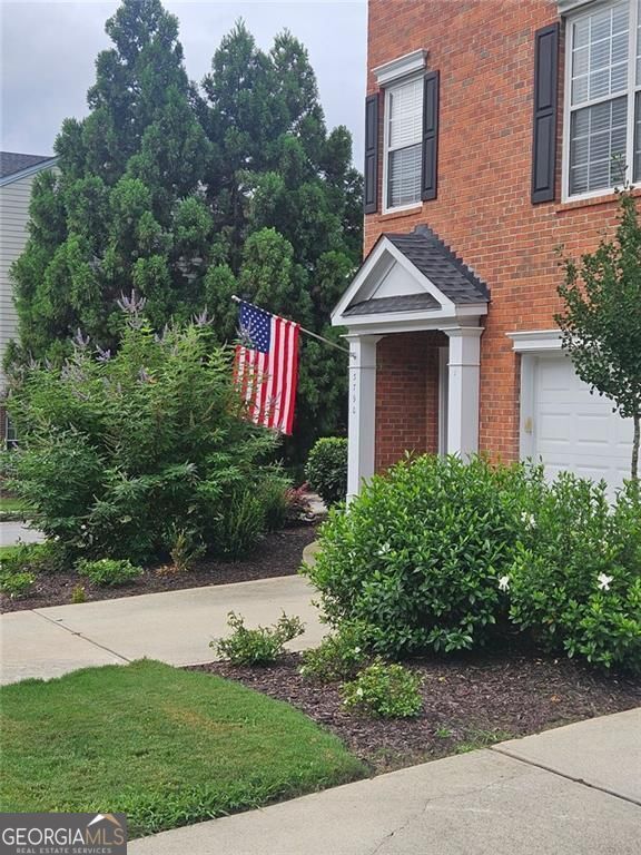 Welcome to this beautifully maintained end-unit townhome tucked in the desirable, gated Chattahoochee Bluffs community. Offering the perfect blend of privacy, natural light, and convenience, this home is just minutes from The Battery/Truist Park, top dining, shopping, and trails to the Chattahoochee River. Inside, the open-concept main level is designed for today's lifestyle, featuring a fireside family room, defined dining area, and a generous kitchen with a breakfast bar and sightlines to both the living room and the oversized back deck-perfect for entertaining or enjoying quiet mornings. Upstairs, you'll find two ensuite bedrooms with walk-in closets, including a vaulted primary suite with abundant windows that flood the space with natural light. The finished terrace level provides a versatile flex room-ideal as a media room, office, gym, or guest retreat-with access to a private patio. It's also plumbed and ready for a full bathroom addition, offering even more flexibility. New roof and a whole-home water filtration system, this home is turnkey. Community amenities elevate the lifestyle with a resort-style pool, fitness center, clubhouse, nature trails, and secure gated entry. The HOA meticulously maintains the exterior and grounds, providing peace of mind and a true low-maintenance lifestyle. Unbeatable access to I-75, I-285, Vinings, Buckhead, and Midtown.