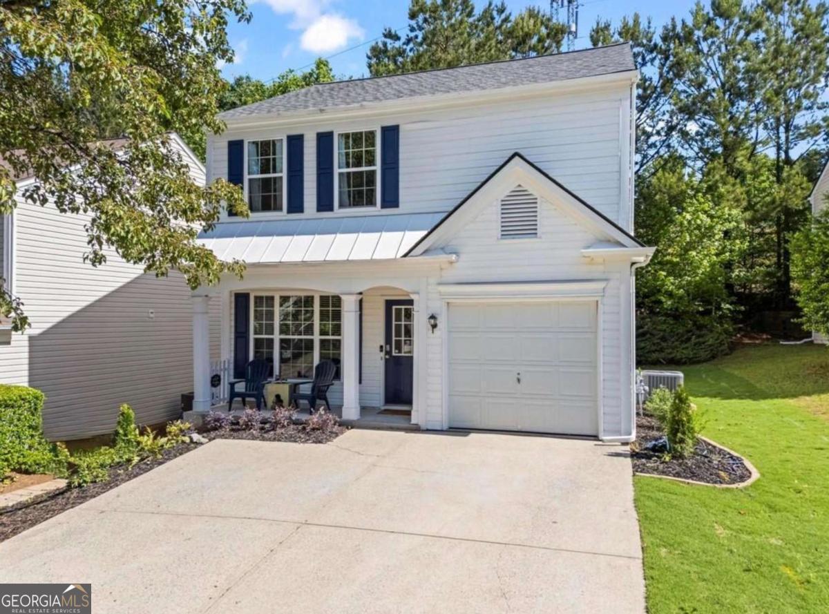 Welcome to this beautifully updated 3-bedroom, 2.5-bathroom home located just minutes from the vibrant shops, dining, and entertainment of Downtown Alpharetta and Avalon. Thoughtfully renovated, this home features an open floor plan filled with natural light, perfect for modern living. The kitchen boasts elegant quartz countertops, updated finishes, and flows seamlessly into the dining and living areas. A cozy gas fireplace adds warmth and charm to the intimate living room, making it the ideal spot to relax. Upstairs, the spacious primary suite includes a walk-in closet and a private en-suite bath. Two additional bedrooms share a full bathroom, perfect for guests, family, or a home office setup. Step outside from the kitchen to a private rear patio, perfect for grilling or enjoying your morning coffee. HVAC (2 years old), Roof (2 years old), and Hot Water Heater (4 years old). Investor friendly - No Rental Restrictions.