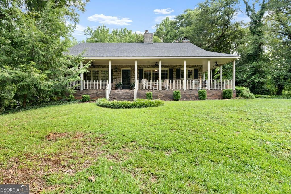Photo of 151 Evans Road, Milner, GA 30257 (MLS # 10808778)