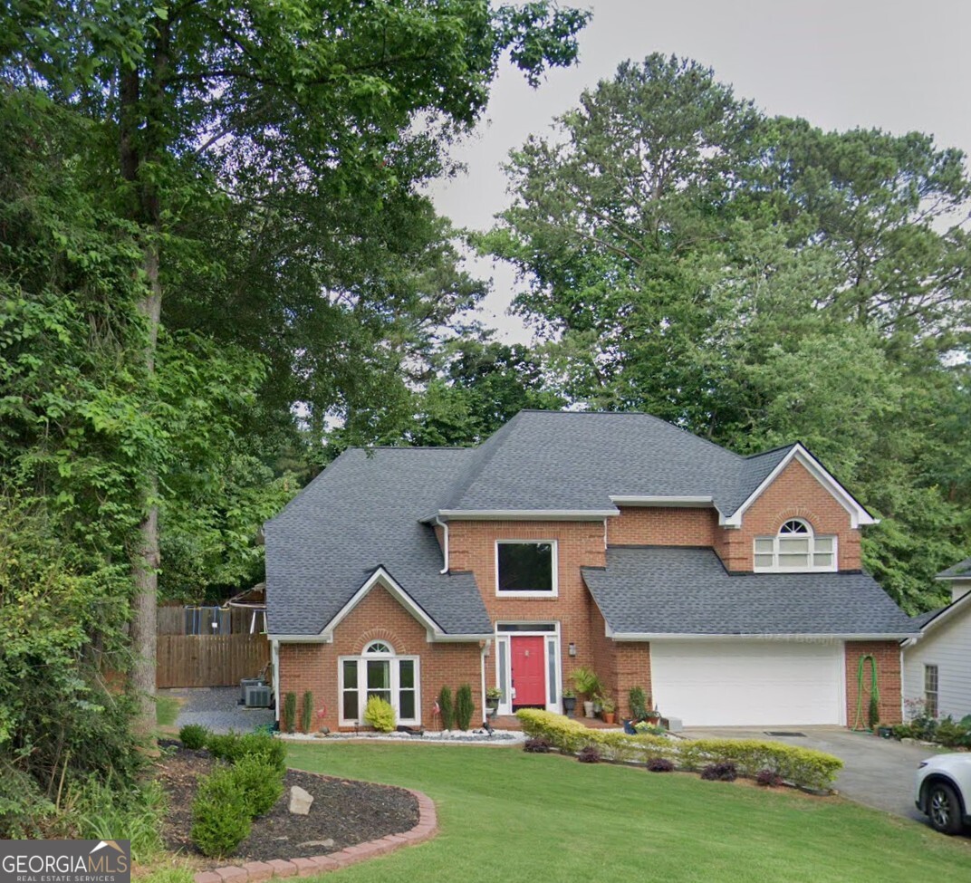 Spacious upgraded home has open concept with a two-story entry with formal Living Room and formal Dining Room. Across the rear of the home is the Family room with fireplace; open to breakfast area & kitchen with upgraded custom cabinets and granite countertops; Hardwood floors throughout Main level. Oversized staircase leads to the Upper level which includes generous master suite with oversized bath including whirlpool tub and separate walk-in shower; 3 additional large bedrooms and hall bath complete the upper level; main floor laundry room with Washer & Dryer. Lawn maintenance included.