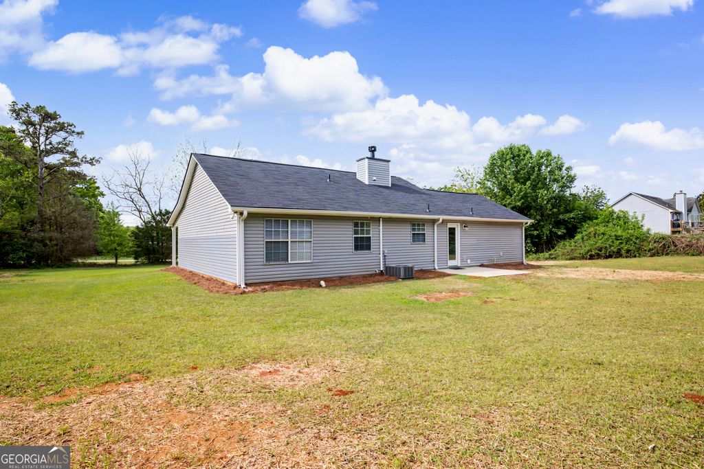 Photo of 613 Coan Drive, Locust Grove, GA 30248 (MLS # 10775841)
