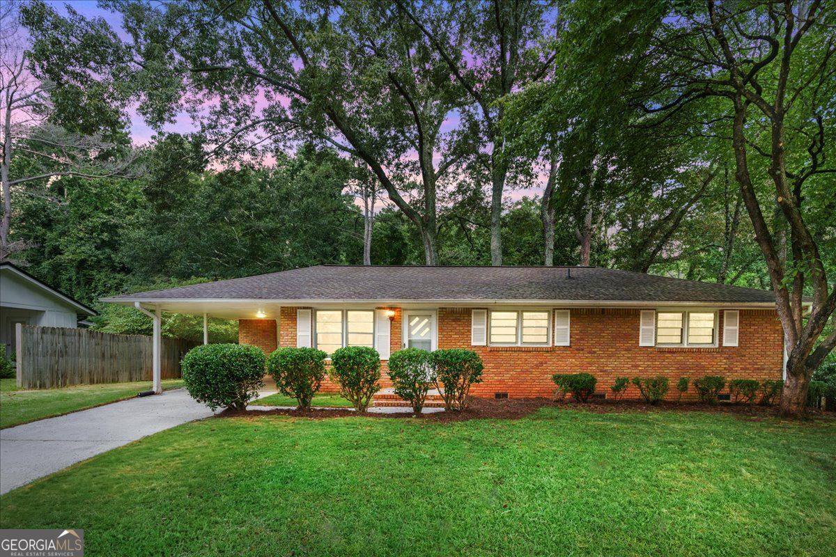 Prepare to fall in love with this precious 3-bedroom, 2-bathroom 4-sided brick Ranch home that sits on a peaceful, private fenced-in lot in a friendly and clean neighborhood. With NO rental restrictions and NO HOA, this beautiful brick ranch home can be lived in immediately while also slowly renovating to your heart's desire. Added BONUS, Seller will replace the carpet for the new lucky homeowner!! This is a unicorn of an opportunity suitable for any first-time homeowner to live in and create your own beautiful little retreat, or to build a real estate portfolio, or both! Featuring LVP floors and plenty of natural light, the flow of this home's floorplan makes it easy to expand on. Excellent LOCATION! 5 minutes from Kennesaw State University, 1.5 miles from the I-75, ten minutes to the very popular Battery for TONS of delicious dining options and shopping! Less than a 30-minute drive to the ATL Airport, Buckhead and Midtown! Come and see the dream!