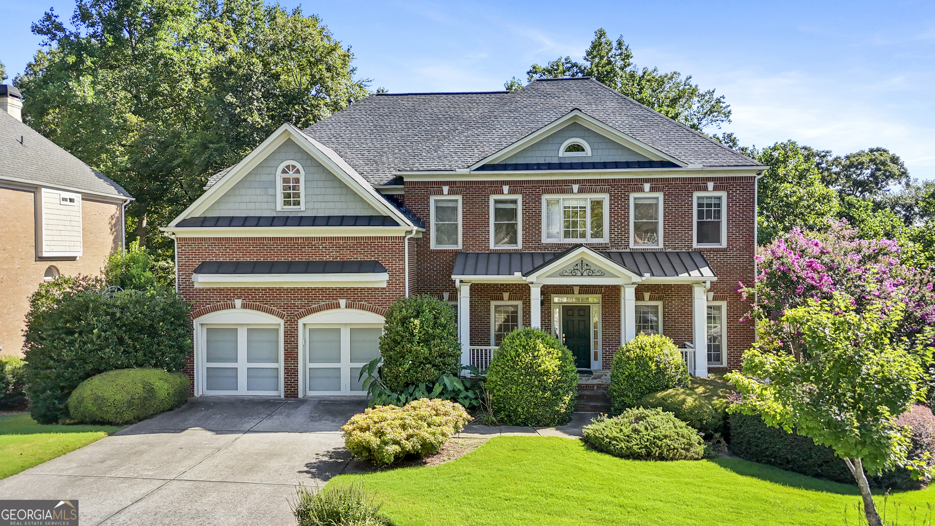Come see this stunning home in the Parkside Section of Hamilton Mill located close to the clubhouse. This beautifully maintained 6 bedroom, 5 bath home offers elegant living space designed for both comfort and style. Step inside to discover a spacious layout that includes a 2 story foyer flanked by a large office/living room and a large dining room. Straight ahead carries you into the large family room with 2 story windows showcasing the private backyard. The large living room opens into a beautiful kitchen and dining area. Don't miss the in-law suite on the first floor with walk-in shower. The finished basement includes a private bedroom, full bathroom, and large living room ideal for guests, multi-generational living or entertainment. Upstairs gives you 2 large bedrooms with a Jack and Jill bathroom and a small playroom/office in one of the bedrooms. The spacious master suite features a cozy sitting room and spa-like bathroom perfect for relaxing after a long day.