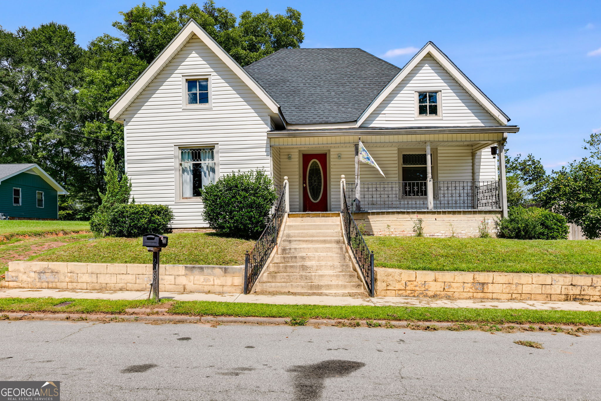 Here is your chance to own a piece of history in downtown Bremen! Step back in time with this classic 1920s historic home full of character and potential, including touches like original leaded glass accent windows and a large, traditional covered front porch. Featuring 3 spacious bedrooms, 2 full baths, and a dedicated laundry room, this property offers the perfect canvas to restore and customize into your dream home. Recent updates include newer roof (installed 2021), updated plumbing, electrical, and ductwork, and double-paned windows. The home boasts timeless details and the opportunity to bring it back to its former glory. Located in a prime spot, you'll enjoy easy access to shops, dining, and community events while being part of one of the area's top-rated school districts. Three storage buildings remain; all have electricity, giving you options for an on-site workshop in the spacious backyard. Oversized, newer deck creates the ideal outdoor living space. Whether you're an investor, history lover, or a family looking for a home with character, this property offers unlimited potential in a location that can't be beat. Don't miss your chance to own a piece of Bremen's history - schedule your showing today!