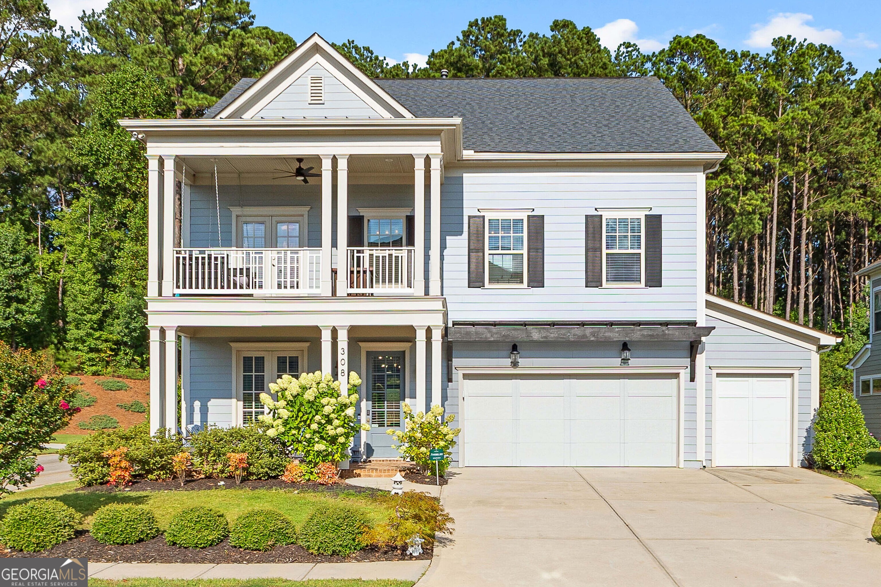 Impeccable Peachtree City residence in coveted Everton Parkside with a private luxurious pool! Travertine paver patio with a stunning Bellareed Luxury Pebble Tec pool and hot tub. Hardwood floors usher you into the foyer, hosting a perfect light-filled office with French doors to the covered brick front patio! Lovely open floor plan ideal for entertaining, with the living room flowing into the adjoining kitchen. The breakfast area features gorgeous views of the stunning, professionally landscaped backyard oasis! You can dine in the screened-in patio while enjoying the outdoor air. The formal dining room and guest powder room complete the main level for seamless entertaining. The second story hosts the private, oversized primary bedroom suite with a relaxing sitting area and a luxurious bathroom with a spacious shower. Three additional bedrooms on the second level provide ample space for sleeping, playing, and working. Surprise loft area to enjoy company, relax in the evening, or add workout equipment. Don't forget the second-level porch, perfect for a book and a cup of coffee. Don't forget the extended golf cart garage, which accommodates a 6-seater golf cart, as well as storage & gym. This home is a show stopper! Everton offers a prime Peachtree City location with a series of amenities, including a network of parks and golf cart paths that connect the neighborhood to the rest of Peachtree City's golf cart paths. Other amenities include: two swimming pools, a splash pad, an open-air cabana, playgrounds, walking trails, tennis, and pickleball courts. Located in the award-winning McIntosh School District! Close to I-85 and an easy drive to Hartsfield-Jackson International Airport.