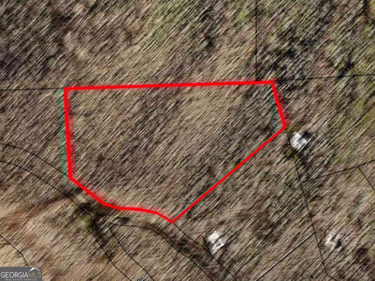 6.51 Acres with Breathtaking Mountain Views - Ready for Your Dream Home! Discover the perfect canvas for your mountain retreat on this 6.51-acre parcel featuring year-round panoramic mountain views. With Level 3 soil work already completed for two homesites, and power available at the road, this property is ready for your builder to break ground and bring your vision to life. Enjoy the peace and privacy of the mountains, with a couple of ideal homesites already identified. Take a look at the neighboring home to see just how spectacular your future views can be! Situated in a prime location between Blue Ridge, Blairsville, and Murphy, NC, you're just minutes from Lake Nottely, Lake Blue Ridge, and the Toccoa River-perfect for fishing, kayaking, tubing, or just soaking in the serene waters. Outdoor enthusiasts will love being close to hiking trails, waterfalls, mountain biking, and more. Convenient to both Fannin and Union Counties, enjoy easy access to charming small-town amenities including shopping, dining, and vibrant local events. Whether you're building a full-time residence, vacation getaway, or investment property. This land has the setting, space, and potential to make your dreams come true.