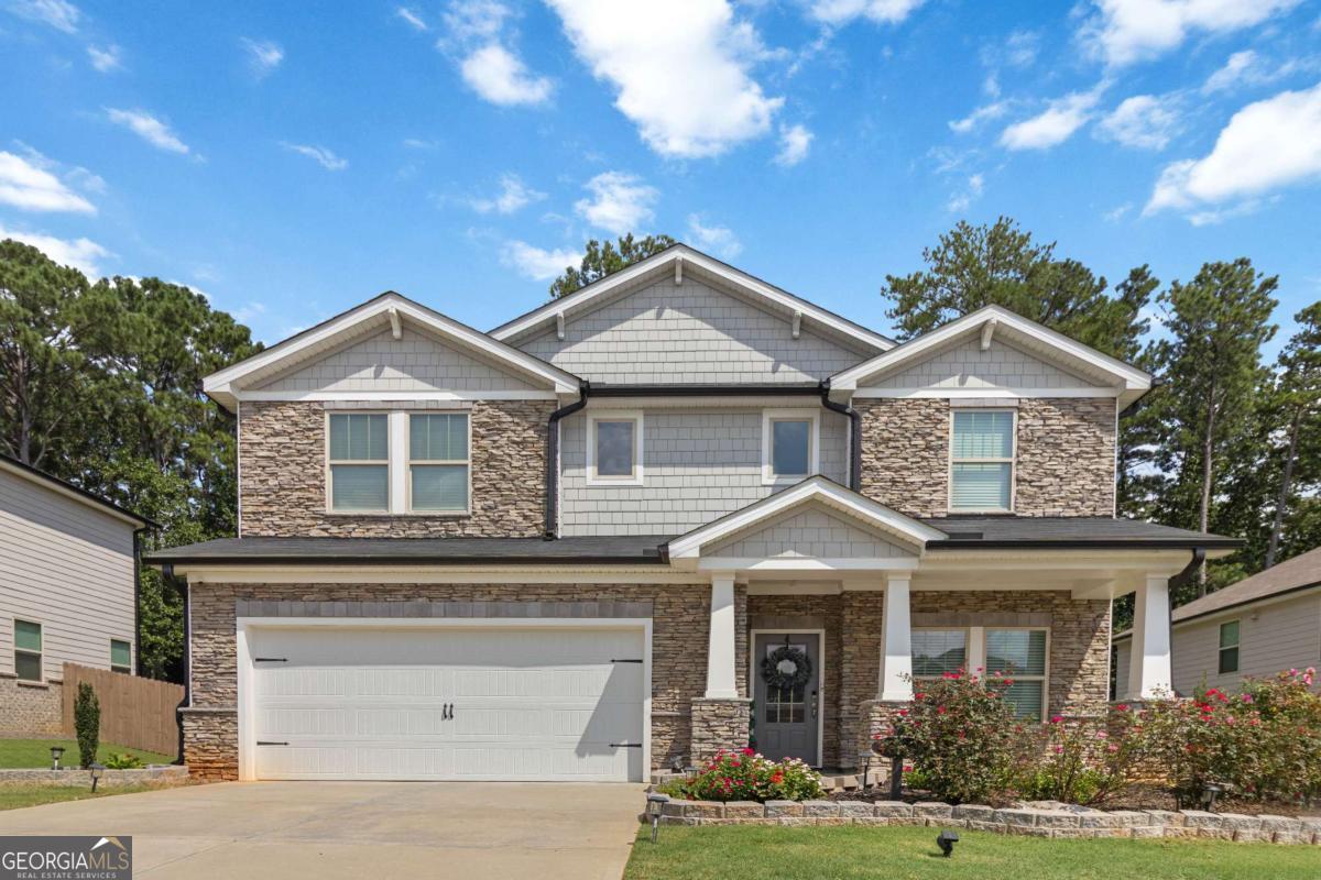 Welcome to 4377 Bethany Manor Drive! This spacious 5-bedroom, 3-bath home features an impressive two-story foyer that opens into a gourmet kitchen and open-concept living area, perfect for entertaining. Enjoy two versatile flex spaces on the main level plus a large loft upstairs ideal for a media room, playroom, or home office. Nestled in desirable Bethany Manor, this home offers both comfort and convenience with easy access to The Shoppes at Webb Gin, Downtown Snellville, dining, parks, and more. Schedule a viewing today!