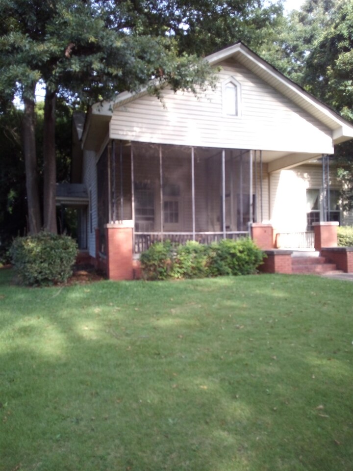 This is a three bedroom two bath historical home which has been owned by the same family since it was built in 1912. It has 12 foot ceilings, original molding and hardwood floors. There is an unfinished bonus room and an extra shower off the laundry room. The large living room has a fireplace with gas logs and the huge dining room has a built-in window seat with storage underneath. While this house needs work, it was beautiful once and it can be again Come see it!