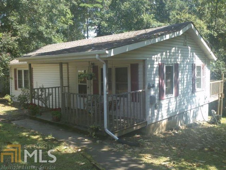 Investor Opportunity! This home is now leased for one year at $850/month. Charming, budget friendly bungalow on over ½ acre! This 2 bedroom, 1 bath home offers an inviting front porch that leads into the living room with laminate wood floors, an eat-in kitchen with refrigerator, gas range, & dishwasher, walk-in closet in larger bedroom, and a laundry room. Powered outbuilding! Enjoy relaxing on the back deck overlooking a private backyard. Convenient to schools and located near Boundary Waters aquatic center for swimming, biking, & hiking!