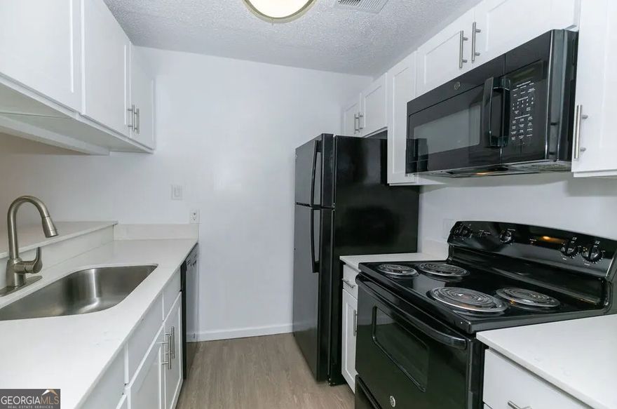 Playground, Dog Park, Pavilion with BBQ & Picnic areas, Controlled Access Gate, Tennis, Pool, & Fitness Center.  Easy access to I-75 & 285, Business Center, Spacious Walk-in Closets, Wood Burning Fireplace in select homes, Private balcony/patio, W/D provided in select homes.