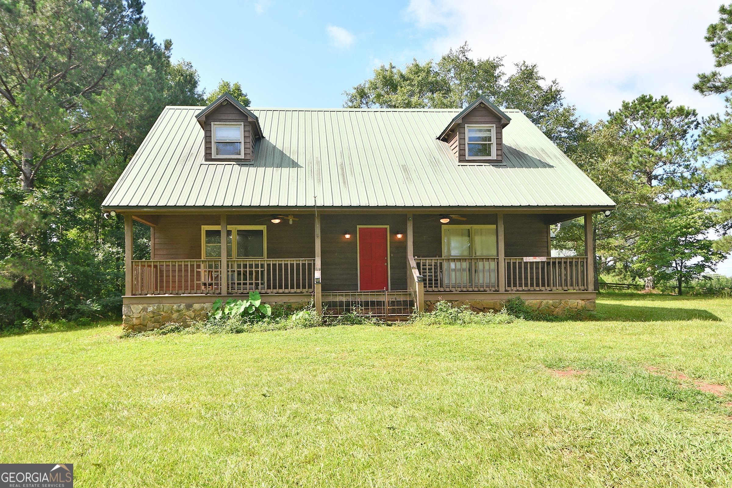 The farming, livestock, and country living lifestyle awaits you with this 3 beds, 2 baths home, 1664 square feet, located on 12.29 acres in LaGrange Ga! Built in 2000 with real hardwood floors, brand new carpets in all bedrooms, two large porches located in the front and rear of the home with brand new screens surrounding the rear porch, fenced in woods and pasture for livestock equipped with a handmade large shed, horse stalls, and nicely built chicken coop with running power and water! Master on the main with a huge walk in closet located in the master's bath, two separate bedrooms and bathroom located upstairs, wide open living room, kitchen with handmade hard wood kitchen counter tops and separate laundry room! Come check out this unique property and what all it has to offer today!