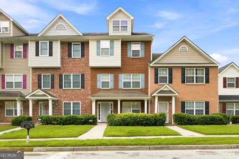 Photo of 6345 Olmadison Place, Atlanta, GA 30349 (MLS # 10813066)