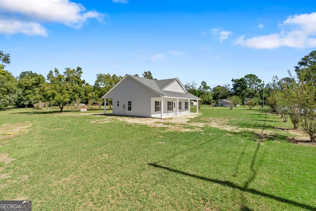 Photo of 156 Proctor Street, Pelham, GA 31779 (MLS # 10880103)