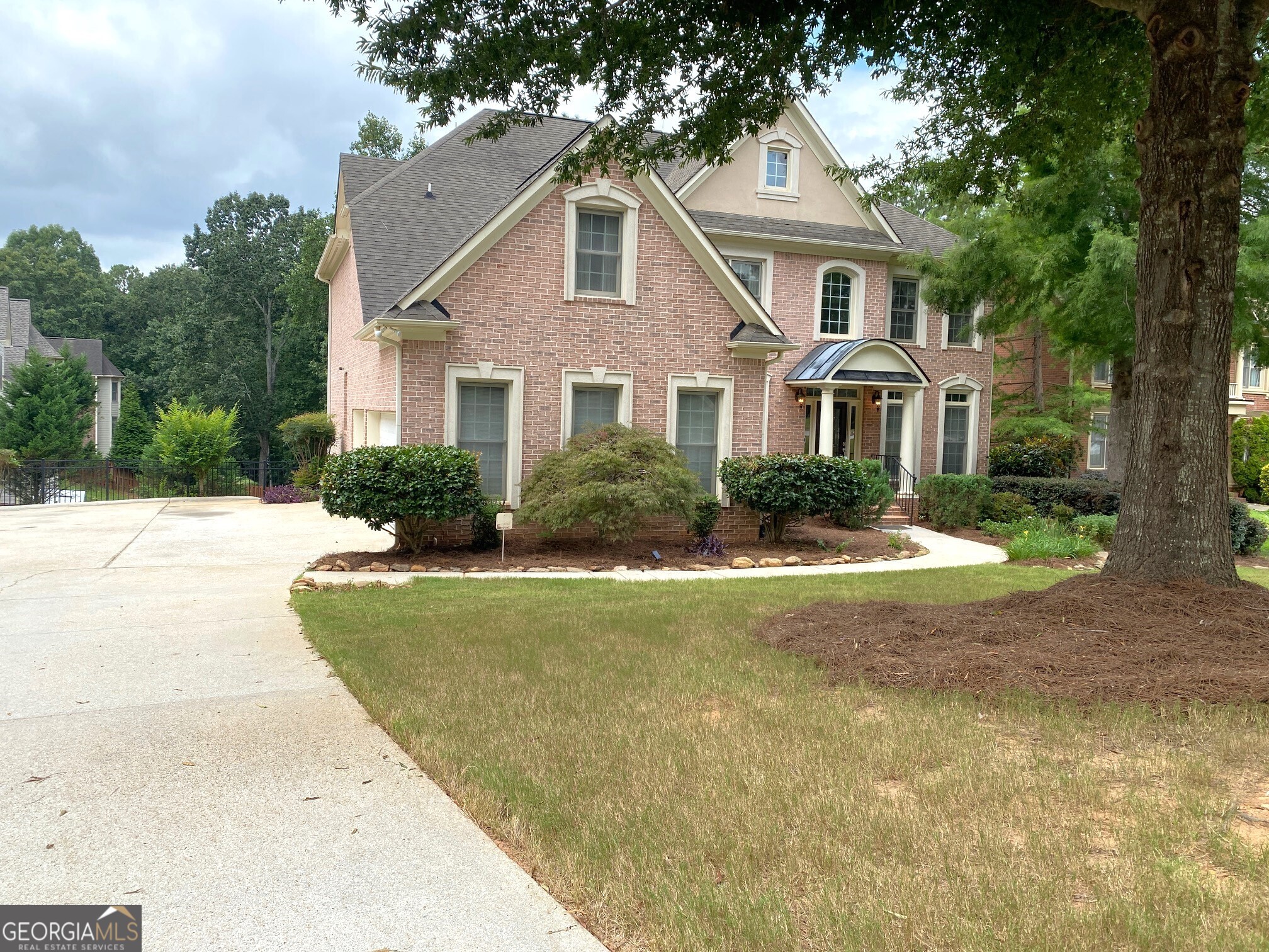 This Lithonia gem is in pristine condition. A Beautiful Masterpiece with Exquisite Craftsmanship! The open-concept design enhances the airy, light-filled atmosphere, while hardwood floors add warmth and elegance. It boasts a 2-story foyer that meets the separate living, dining rooms, & breakfast area, opening up to a stunning great room with soaring ceilings & windows. With a possible guest room on the main floor. A stellar kitchen with stunning island & plethora of full-size cabinets, Stainless Steel appliances, gas cook, electric water heater. Spacious master suite with large spa bath, double master closets, his & hers. 3 Large additional bedrooms & 2 bathrooms upstairs. 1 additional bedroom and 1 bathroom on the main floor. If additional space is needed, come with a vision to transform 85% of an unfinished basement into your entertainment world. When completed full basement will have 1 additional bedroom, a home Gym, a theater room, a pool area, and an Office. The seller will leave the material already in place. House comes with an American Home Shield one-year warranty, Ring Security System, some furniture, an entertainment system, and water purification, installed.