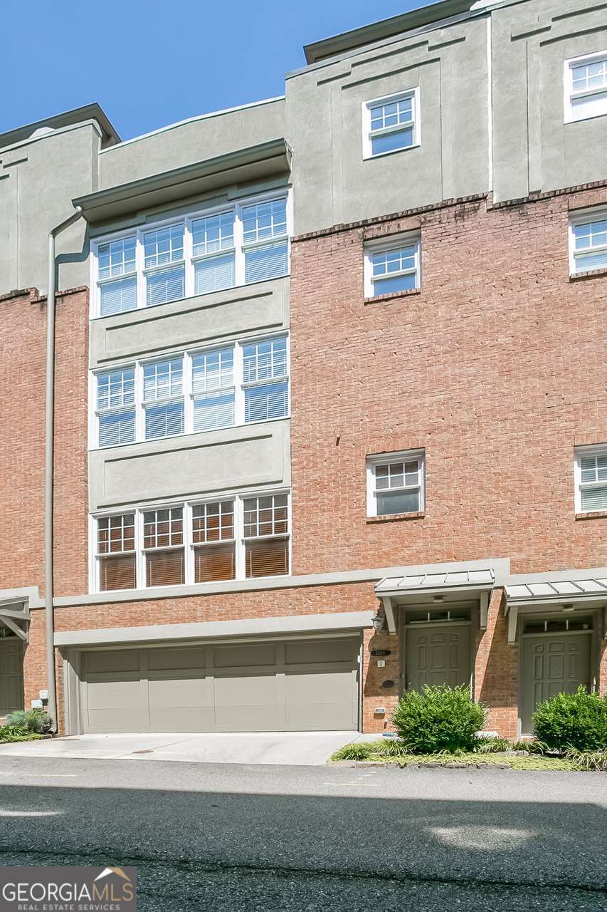 Amazing opportunity to be at Piedmont Park & the Atlanta Beltline. All of the benefits of the park with much less congestion than the west side. Fantastic views from the rooftop terrace! This is a lovely 2 bedroom 2.5 bath town home that lives like two master bedrooms - each on its own floor with spacious baths and closets. Primary living space is large, open, and bright. Two car attached garage with large storage room or small workshop. Wet bar on top floor just before you walk out to the rooftop terrace.