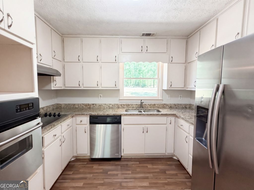 Photo of 213 Carl Parker Road, Hampton, GA 30228 (MLS # 10735984)