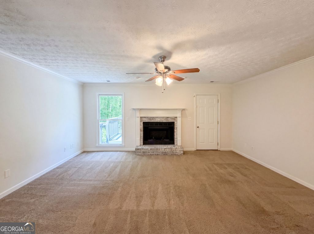 Photo of 213 Carl Parker Road, Hampton, GA 30228 (MLS # 10735984)