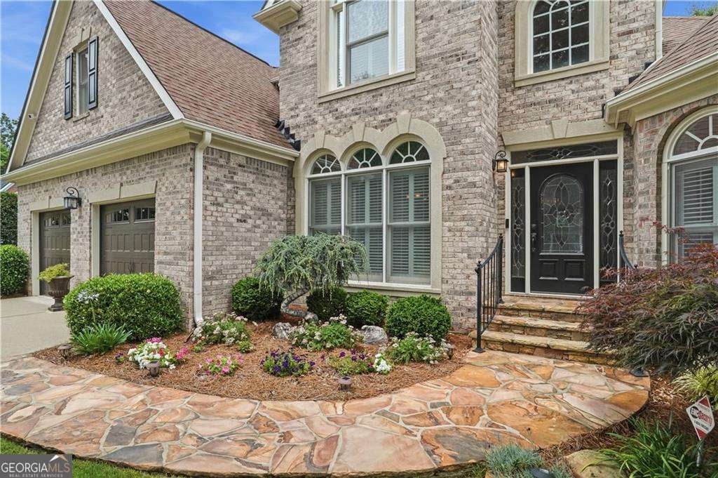 Photo of 4311 Summit Oaks Lane NE, Roswell, GA 30075 (MLS # 10791842)