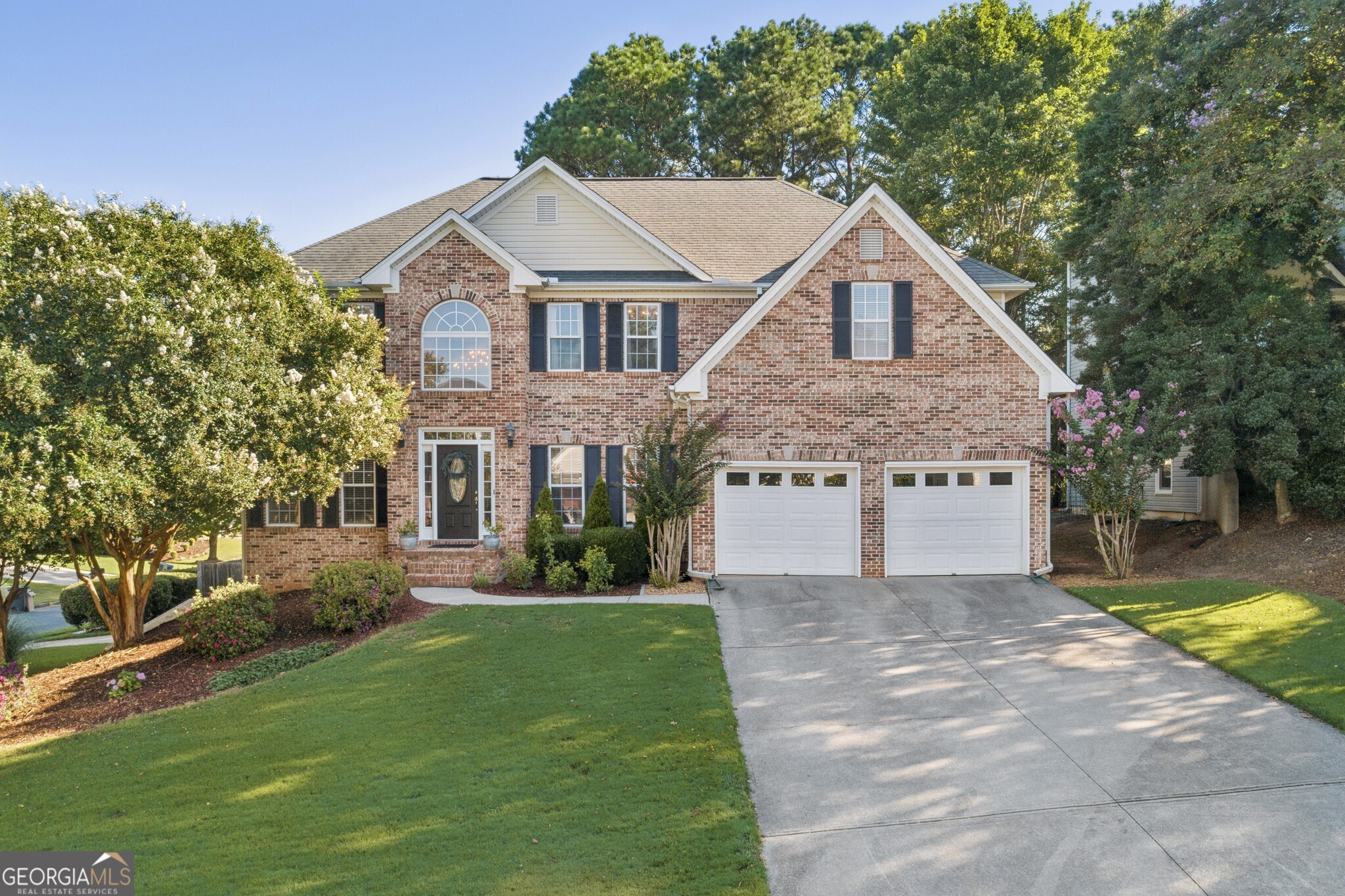 Explore this Stunning Estate-Style Home in Alexander Farms! Step into luxury living in this beautifully updated home boasting a separate 1 Bed/1 Bath In-Law Suite Apartment with its own entrance, adding both convenience and income potential. Nestled on a corner lot in the coveted Alexander Farms Community, this residence stands out as one of the largest and is in the prestigious Hillgrove High School District. The exterior charms with a lush front yard and meticulously landscaped surroundings featuring Crape Myrtles, Boxwoods, and blooming bushes, enhancing the curb appeal. As you enter, a well-lit two-story foyer welcomes you with gleaming hardwood floors, a grand staircase, and exquisite crown molding. To your left, you'll find a Formal Living Room (perfect for a Home Office/Library), and to your right, a Formal Dining Room with Wainscoting Walls that seamlessly flow into the Fireside Family Room. The heart of the home, the updated chef's kitchen, is a true masterpiece with Shaker Dove Soft-Close Cabinets, top-of-the-line stainless-steel appliances, Quartz countertops, and elegant brass finishes. Adjacent, a sunlit breakfast nook offers a charming space for casual dining or enjoying morning coffee. On the upper level, the oversized Owner's Suite impresses with a tray ceiling, a sitting area featuring a modern stone fireplace, and dual walk-in closets. The spa-like ensuite bathroom boasts a double vanity, soaking tub, and separate shower. Additionally, three more bedrooms and two full bathrooms provide ample space for family, guests, or a home office. The fully finished daylight basement adds versatility with a self-contained Apartment/In-Law Suite offering a private entrance, full kitchen, laundry room, bath, and separate garage. Whether for extended family or rental income, this space offers limitless possibilities. Outside, enjoy the meticulously landscaped, fully fenced backyard with a generous deck, updated fire pit, and ample room for outdoor activities, gardening, and entertaining!