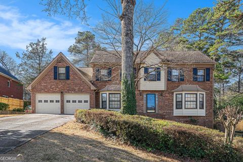 Photo of 921 Cedar Trace SW, Lilburn, GA 30047 (MLS # 10662776)