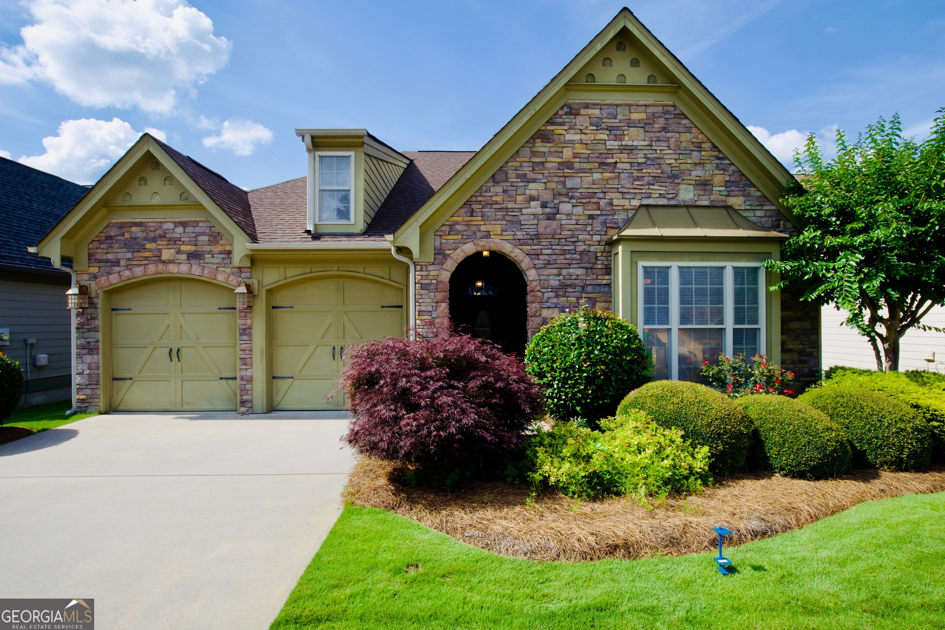Location and charm will make you fall in love with this open floor plan ranch style home in Emory Springs Subdivision. Subdivision is NO LONGER an over 55 adult community. Bring the family! Complete with 3 bedrooms and 2 bathrooms, this Bob Adams home has a great layout with plenty of natural light and wide-open space. At building stage, seller had garage door heightened for large vehicles. Master bath has new shower. This quiet neighborhood is located directly across from Fayette Piedmont Hospital and walking distance to Togwatee Village with restaurants and shops to enjoy. Also, the new multi-use path gives golfcart access to the hospital and schools (Cleveland & Bennett's Mill). The home features central vacuum, corian counters in kitchen, a double-sided look thru gas fireplace, keeping room, open floorplan, huge laundry room, heavy trim, a dedicated permanent gas line to the outside patio for that outdoor kitchen in the future! Screened in patio. Mature FIG tree right outside! This canvas is yours to paint! This home is move in ready and waiting for a new family.