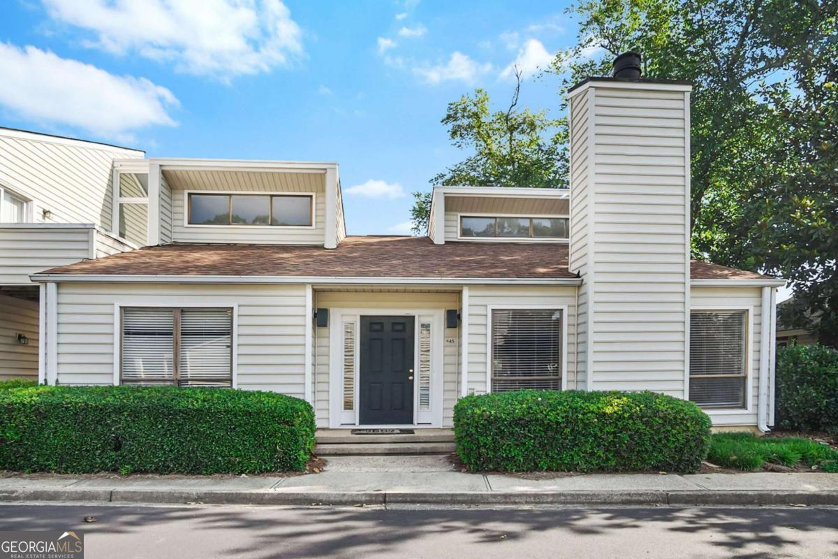Beautifully Updated, Stepless Patio Home in Prime East Cobb Location! This one-level townhome checks all the boxes with stylish updates and unbeatable convenience. Inside, you'll love the updated flooring throughout and a refreshed kitchen featuring soft-close shaker cabinets, quartz countertops, and a sleek four-piece stainless steel appliance package. Both bathrooms have been tastefully renovated, offering modern finishes and functionality. This home truly embraces easy living. Step outside to your private rear courtyard-accessible from two bedrooms-the perfect spot for gathering with friends or grilling for the family. The friendly, walkable community features a swim/tennis center, open green spaces for your furry friends, and pickleball courts. BONUS - the community pool and club house are literally in your backyard. Commuters and shoppers will appreciate being minutes from I-75, Merchants Walk, top-tier dining and entertainment, and East Cobb's favorite parks like Big Trees Forest Preserve and East Cobb Park. Golfers will love being only 1.5 miles to Indian Hills Country Club. All of this in a highly rated school district! Don't miss your chance to live the East Cobb lifestyle you deserve-schedule your showing today!