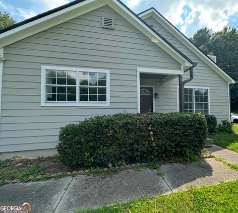 Photo of 910 WINTERSIDE Lane, Atlanta, GA 30349 (MLS # 10798406)