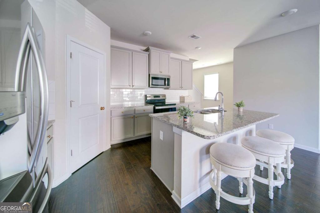 Photo of 1506 Ashbrooke Trace, Stone Mountain, GA 30083 (MLS # 10738161)